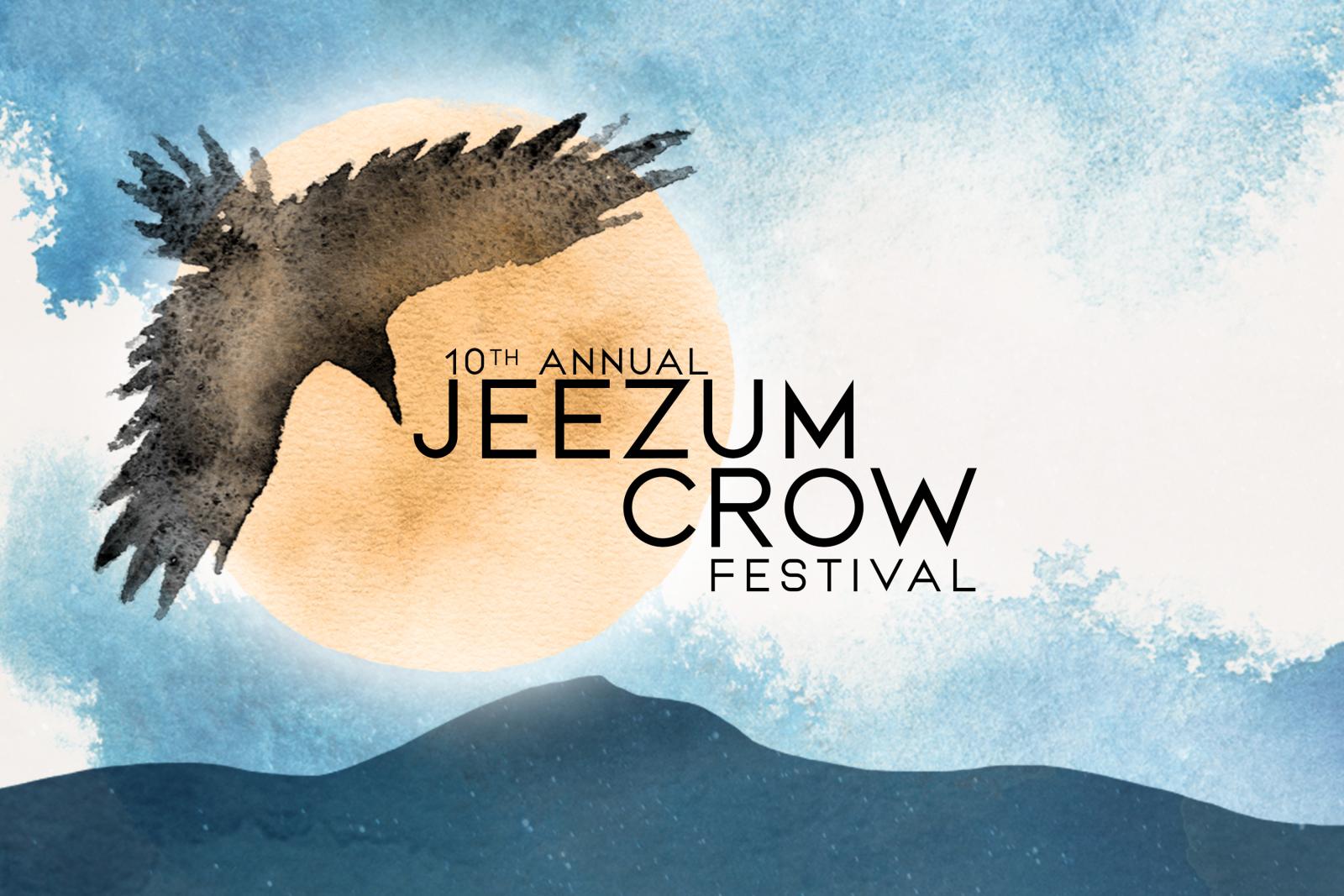 Crow silhouette over sun and hills, watercolor design.